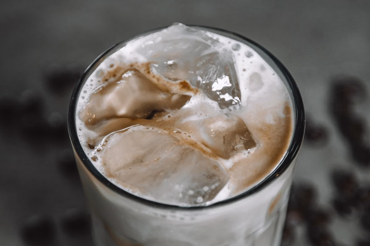 Stock inspiration photo of iced coffee with creamy foam on top; not an actual Babble drink